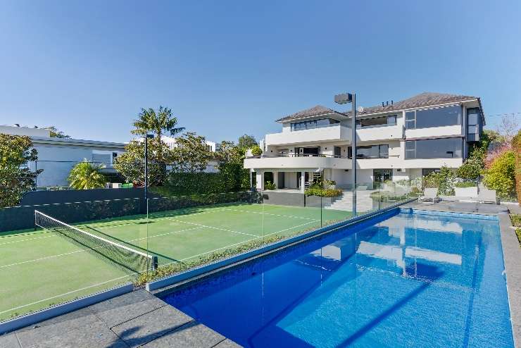 A modern, glass and steel mansion on Burwood Crescent, in Remuera, Auckland, sold for $20.6m in May 2023. The deal was brokered by Graham, Andrew and Ollie Wall, of Wall Real Estate. Photo / Supplied