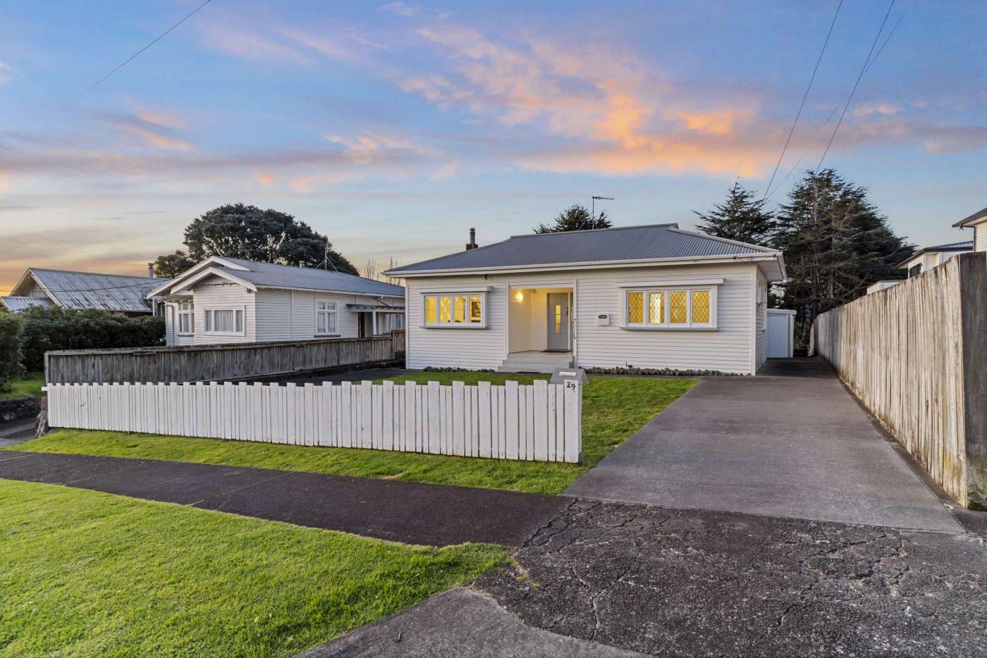 Ten bidders registered for the auction of a three-bedroom bungalow on Korokino Road, Greenlane, which sold for <img.825m. Photo / Supplied