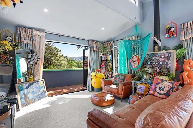 All things bright and beautiful: 221 Woodlands Park Road, in Auckland's Titirangi, heads to auction on April 18. Photo / Supplied