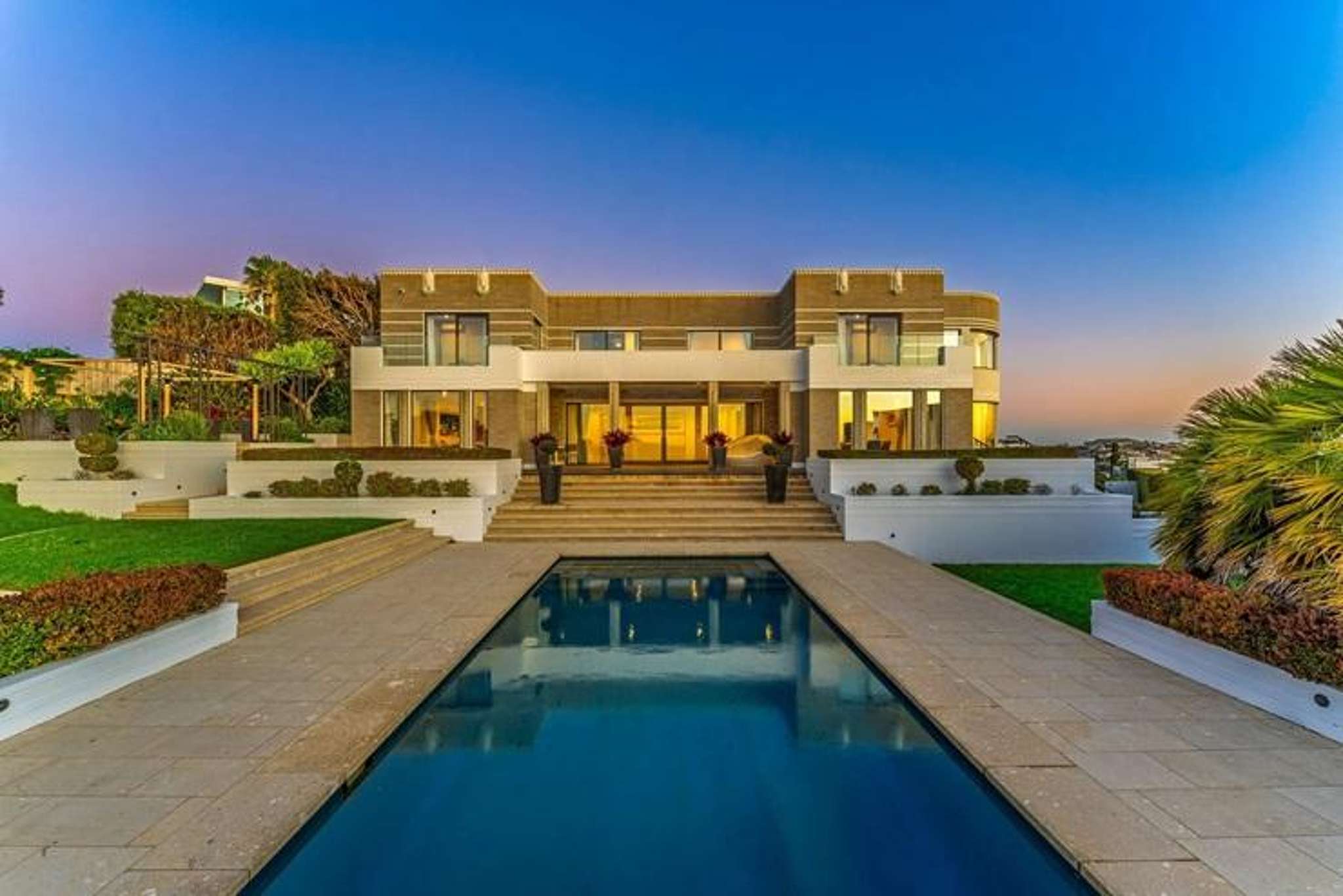Clifftop mansions worth over $45m for sale in Auckland’s ultra-rich enclave