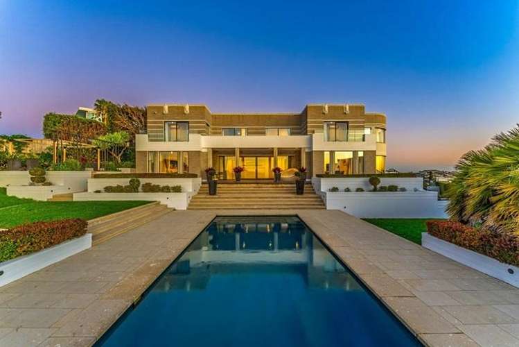 Clifftop mansions worth over $45m for sale in Auckland’s ultra-rich enclave