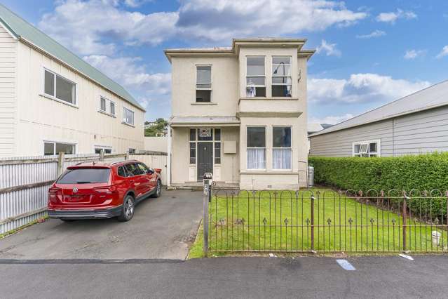 Spacious six-bedroom with upside