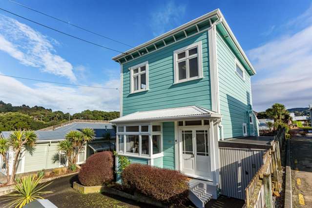 STUNNING NEWTOWN HOME WITH SUN AND PARKING