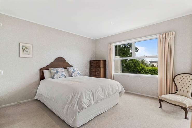 The two-storey townhouse for sale at 99 Marine Parade, in Herne Bay, Auckland, has been pitched as a lock-up and leave. Photo / Supplied