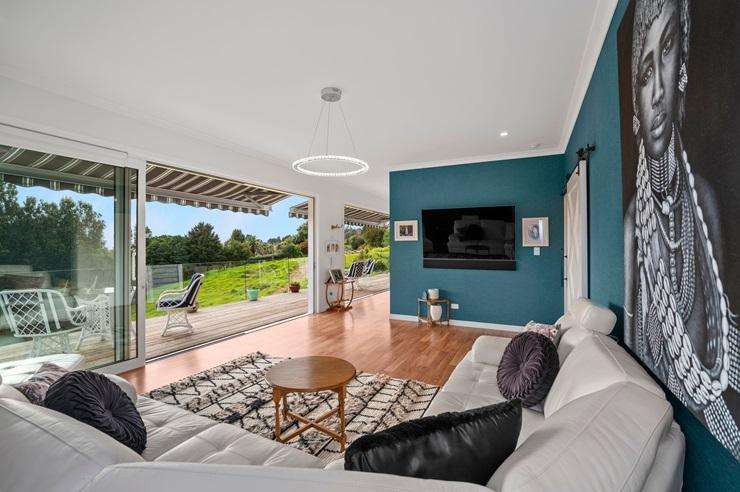 A two-bedroom cottage at 614 Kaitemako Road, in Welcome Bay, comes with its own special piece of protected bush. Photo / Supplied