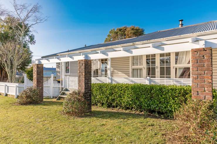 A do-up at 9 Halcyon Road, in Seddonville, Buller, has attracted some ridiculous offers, says the listing agent. Photo / Supplied