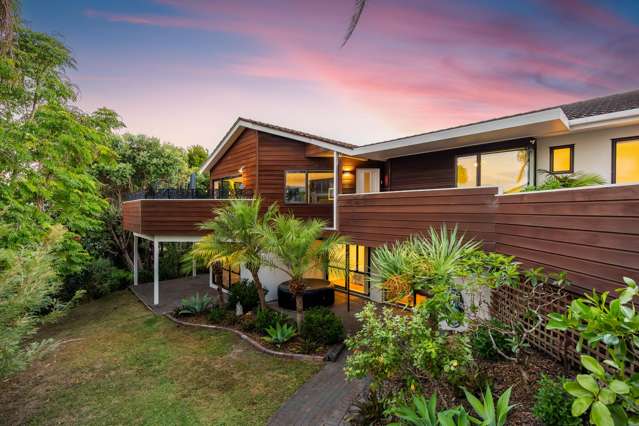Lush Tropical Retreat with Water Views