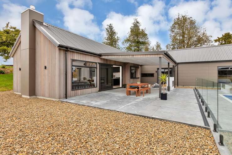 four-bedroom beachfront home on Owai Avenue, in Helena Bay, Whangarei