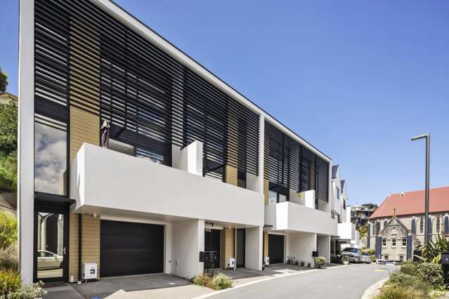 THREE-BEDROOM TOWNHOUSE WITH GARAGING