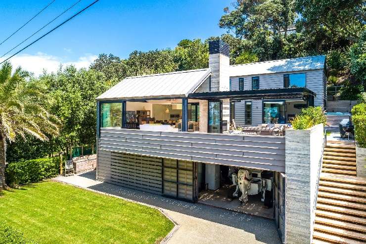 A modern, glass and steel mansion on Burwood Crescent, in Remuera, Auckland, sold for $20.6m in May 2023. The deal was brokered by Graham, Andrew and Ollie Wall, of Wall Real Estate. Photo / Supplied