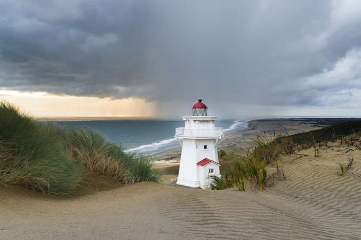 The original lighthouse keeper's cottage in Pouto, Kaipara, is up for grabs. Photo / Supplied