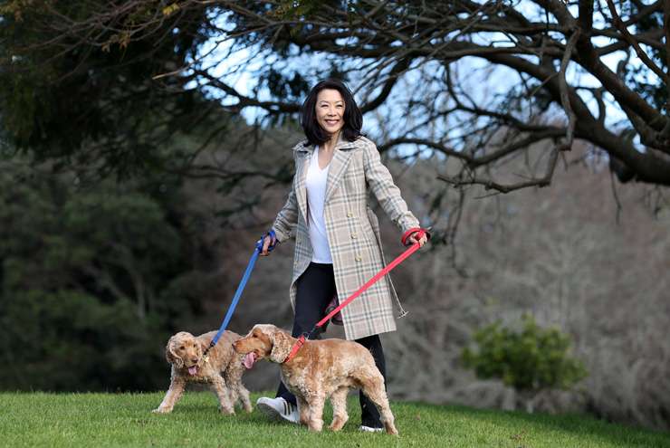 Bayleys agent Lorraine Young with her pet cocker spaniels. 