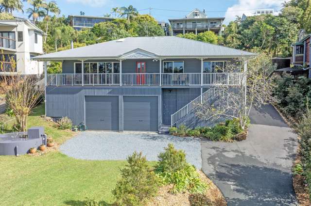 Immaculate 3-Bedroom + Study Home with Coastal & Rainforest Views