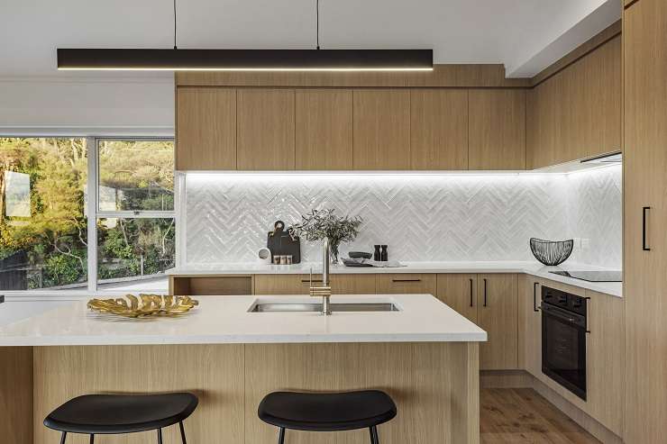 A 1960s home on Glenfield Road, in Glenfield, has been relisted for sale after an impressive eight-week renovation. Photo / Supplied