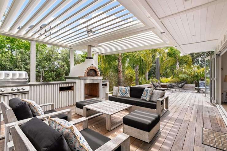 Ray White agent Jayne Kiely is taking her bach at 416 Rangi Avenue, in Whangamata, to auction. Photo / Supplied