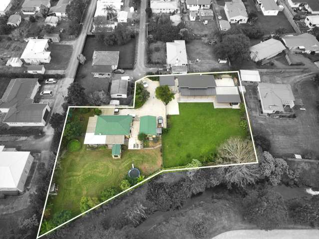 INVESTMENT GOLDMINE - TWO HOMES, ONE PRIME TITLE!