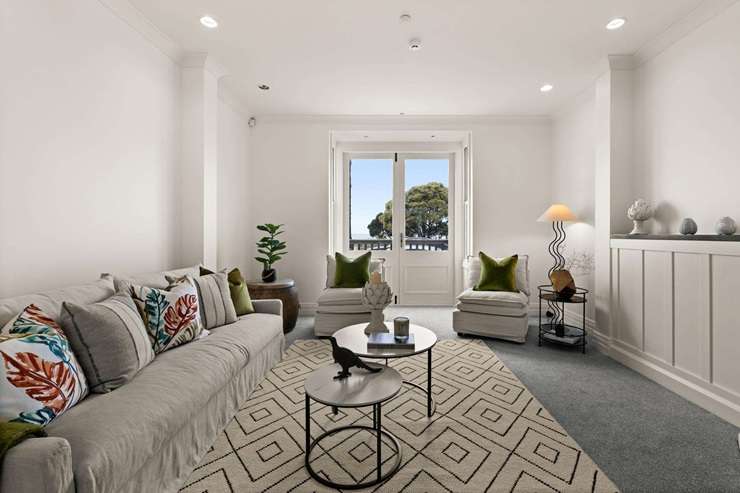 The villa that was home to the Six Sisters Coffee House on Marine Parade, in Napier, has a price indication north of <imgm.  Photo / Supplied