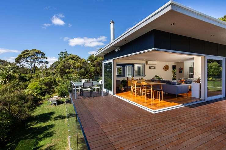 36 Piha Road seems to float above Piha's iconic coastline. It's on the market for $2.985 million. Photo / Supplied