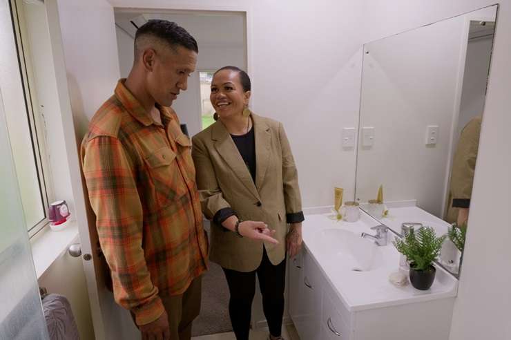 Former Kiwi Fern Kelly Maipi and her partner Phil Pirihi with agent Jayne Kiely. The couple were at the end of their tether when they applied to take part in the second season of AA Insurance Location Location Location NZ. Photo / Supplied