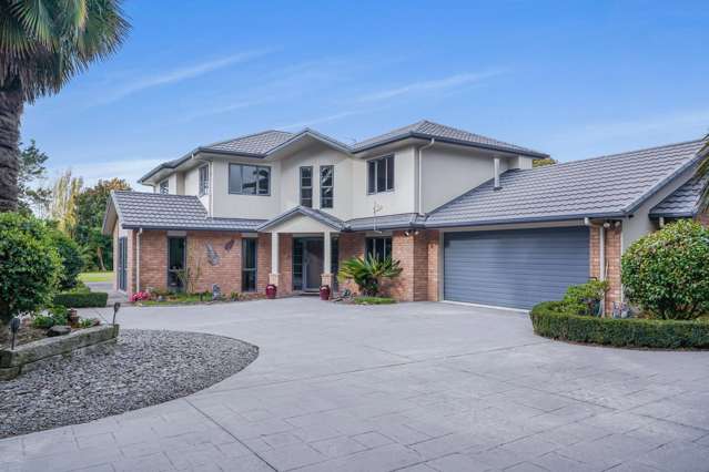 Private Luxury in the prestigious Redbrook Subdivision