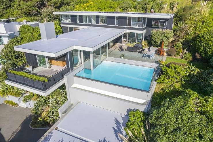 The gated property at 17 Elgin Way in Khandallah, Wellington, has impressive views and is set on large private grounds that back onto the Singapore High Commission. Photo / Supplied