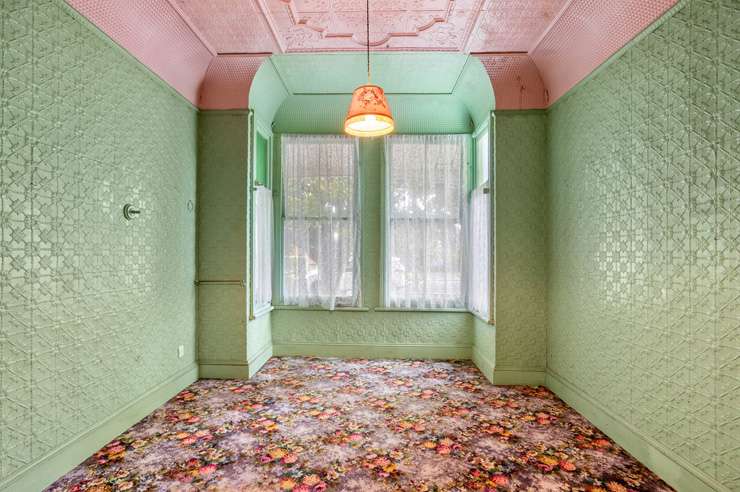 A colourful property at 57 Cardwell Street, in Onehunga, Auckland, goes to auction on February 23. The property's main living area is a striking red. Photo / Supplied