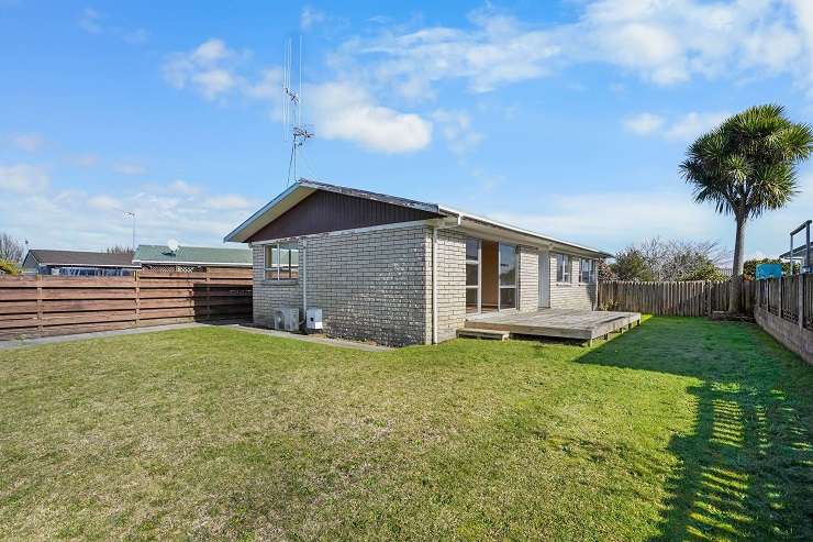 A three-bedroom, one-bathroom brick do-up on Leslie Place, Deanwell, in Hamilton, sold in three days after a competitive bought forward auction. Photo / Supplied