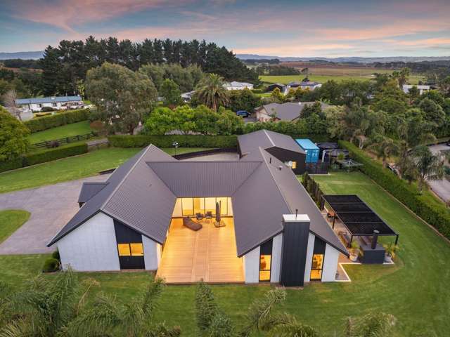 PRICE GUIDE: LOW $1.6m RANGE