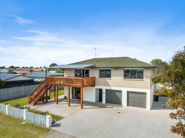 Coastal Home with Extended Family Living Awaits