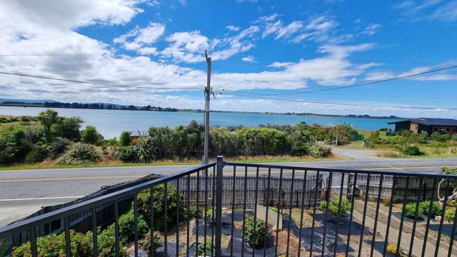 HOME AND LAND OPPORTUNITY!