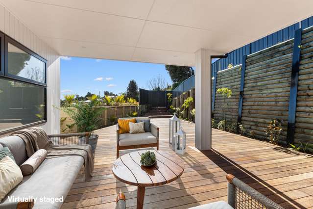 SLEEK, SUN-FILLED, SUPERBLY LOCATED