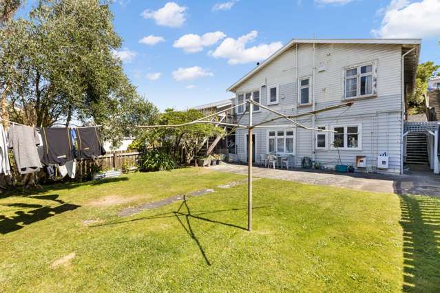1930s Home & Income with Exceptional Potential