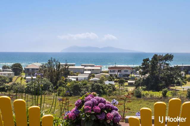 Elevated Coastal Retreat with Breathtaking Views