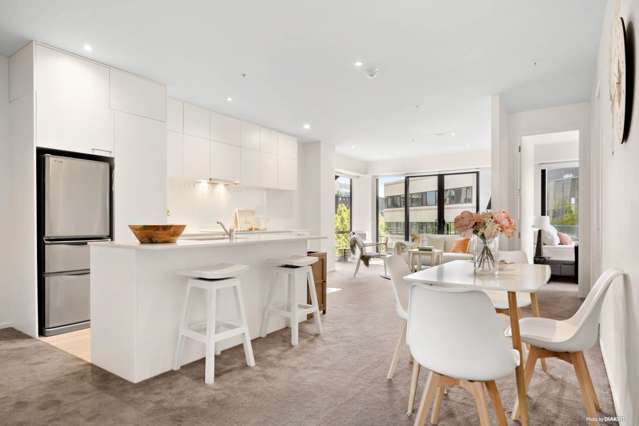 Sun-Filled CBD Penthouse with Parking