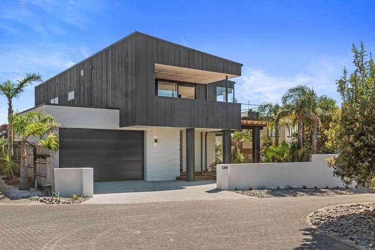 The owners of 18 Peacock Street, Glendowie, in Auckland’s eastern bays want to sell their Karaka Bay-side house to move to Omaha. Photo / Supplied