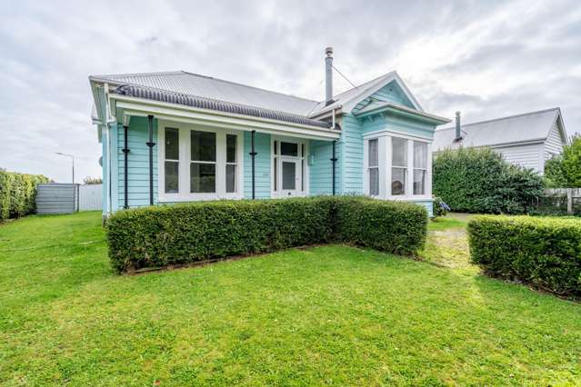 This 4 bed, 2 bath home is right up your alley.