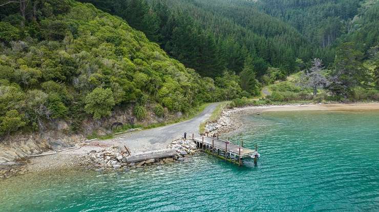 Waikakaramea Bay (pictured) and Deep Bay on Arapaoa Island, in Marlborough Sounds, are for sale with a combined asking price of $3m plus. Photo / Supplied