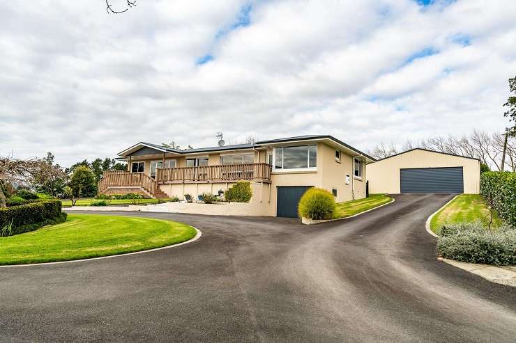 A sprawling four-bedroom, two-bathroom 'castle' on Kimihia Road is an unusual find for Huntly. Photo / Supplied