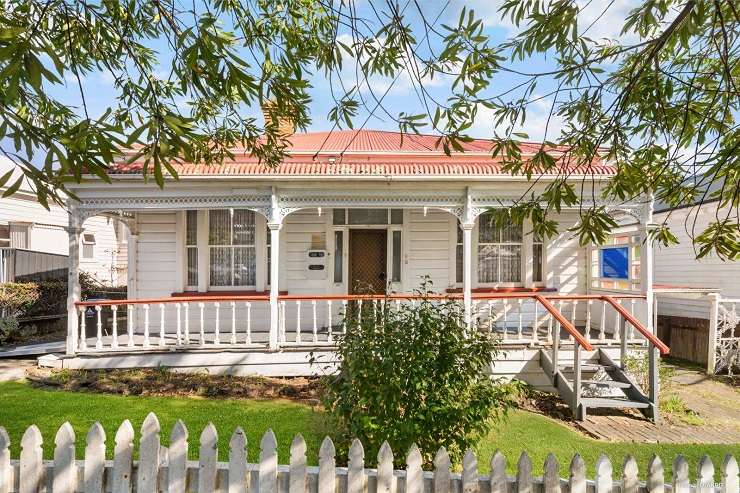 white two storey victorial villa with bay window  16 Paget Street Freemans bay