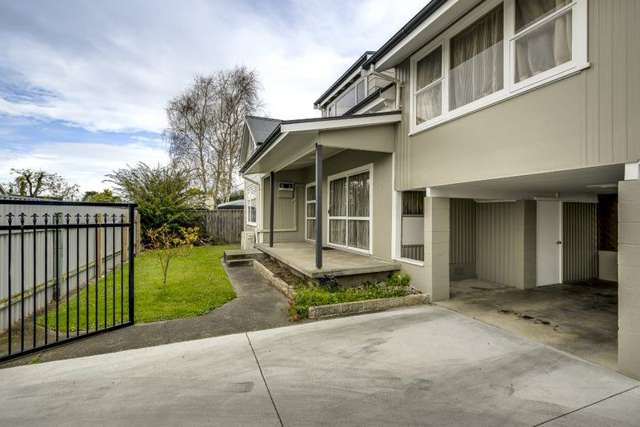 Fully Fenced with single garage and carport