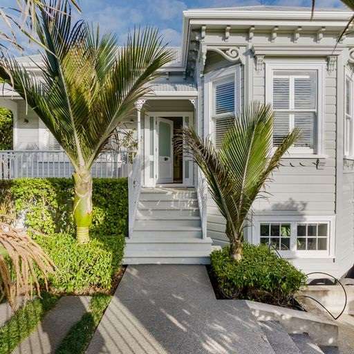 ornate two-storey villa with balcony and brick wall  27 Herne Bay Road, Herne Bay, Auckland