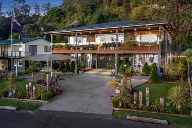 LUXURY WATERFRONT HOME & INCOME