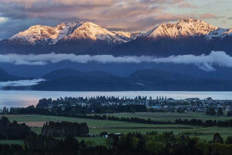 Te Anau has stunning scenery, but property prices in the lakeside town are much more affordable than those in neighbouring Queenstown. Photo / Getty images