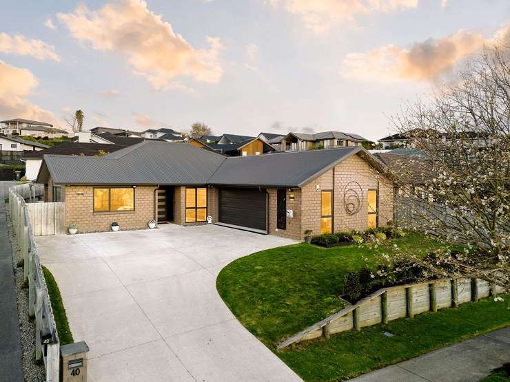 A five-bedroom, two-bathroom home on Amberley Place, in Flagstaff, exceeded the owners' expectation when it sold under the hammer for <img.2025m last week. Photo / Supplied