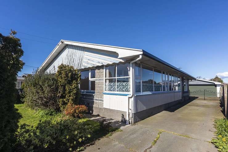 The Coopers Road house, in Burwood, Christchurch, featured carpet reclaimed from the Tivoli Theatre in the mid-1990s. Photo / Supplied