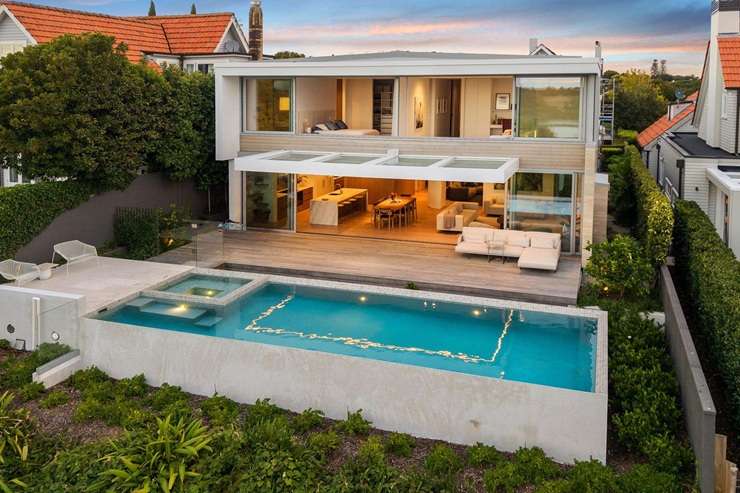 The $43m house on Arney Road sits on a 1.2ha estate overlooking the harbour. Photo / Alex Burton