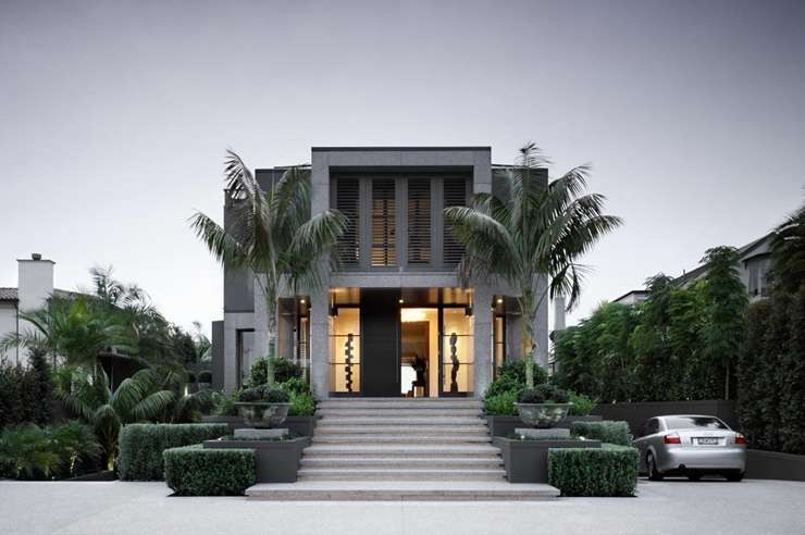 Jason Statham and his partner Rosie Huntington Whiteley. They rented one of this year's most expensive homes while Statham was filming in Auckland. Artwork / Beth Walsh