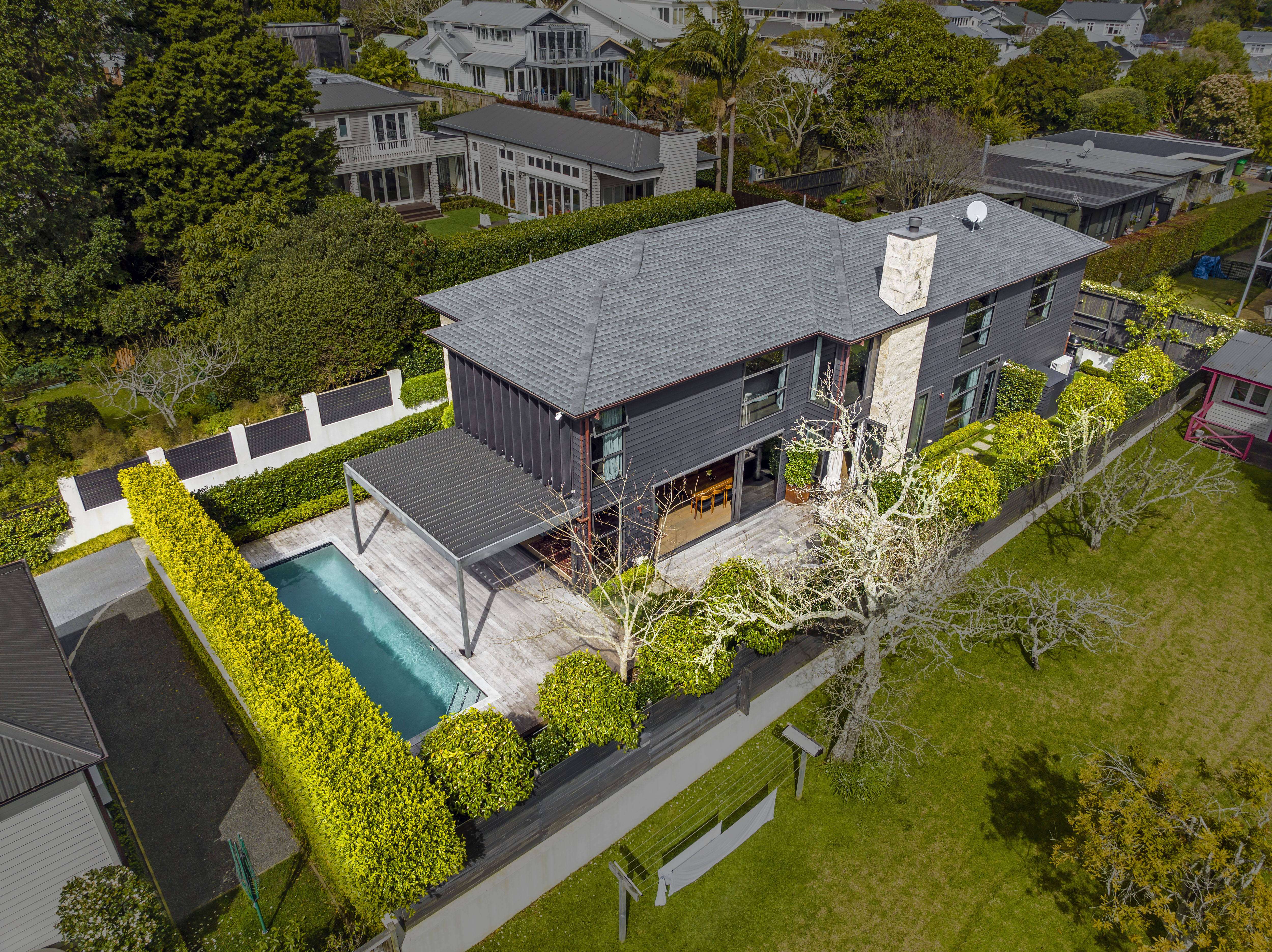 white villa with hedges in front  35 Grosvenor Street Grey Lynn Auckland