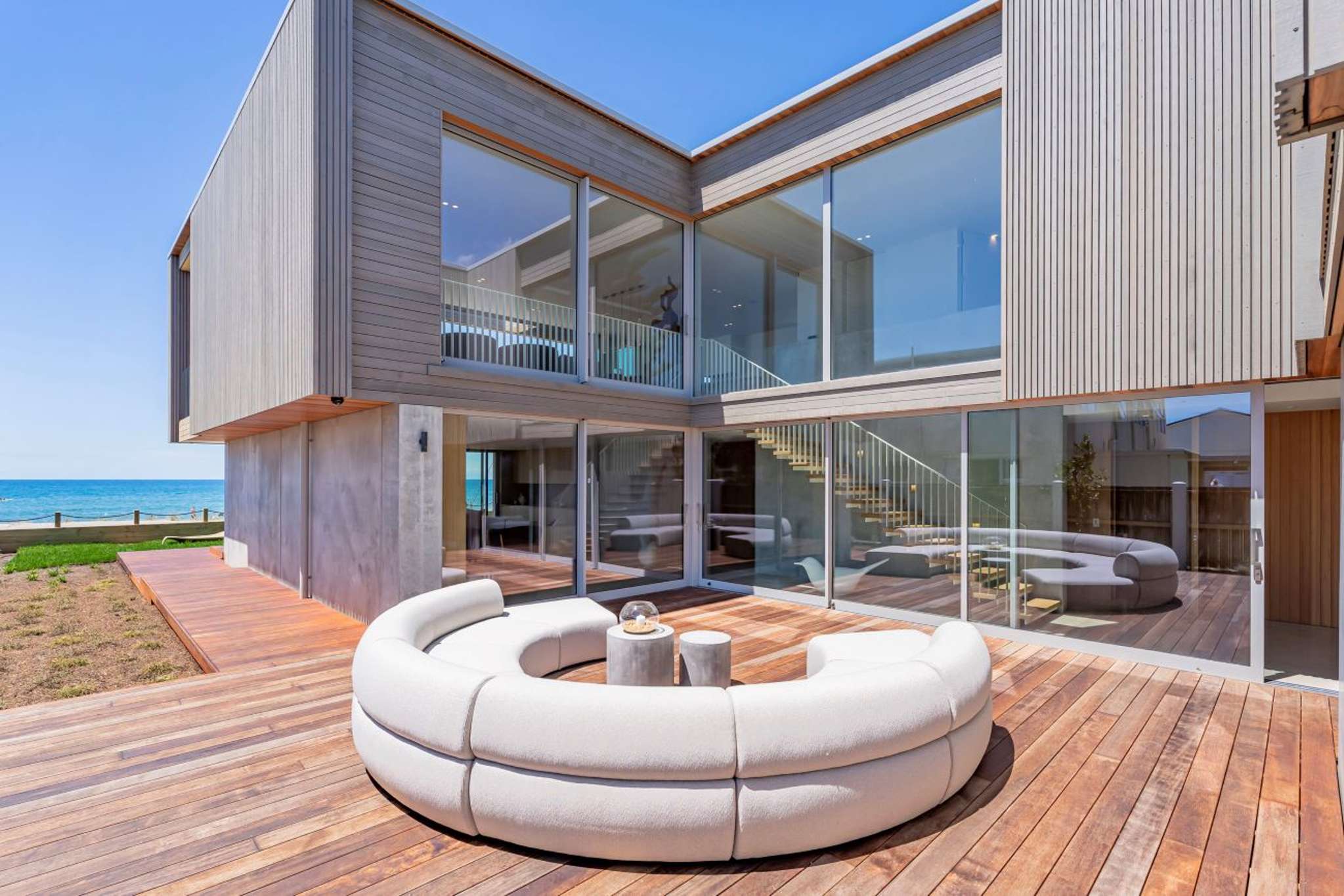 New beachfront home with mechanical sliding decks and panels for privacy is up for grabs