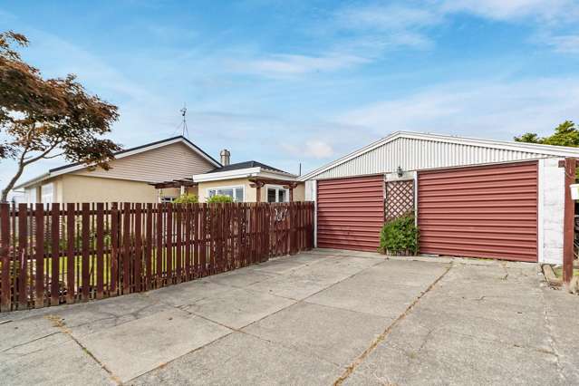 FOUR Bedrooms, TWO Bathrooms, Garages AND Living Areas
